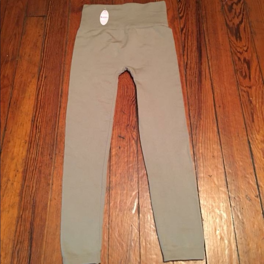 Boutique khaki fleeced lined leggings.  Fits 0-10